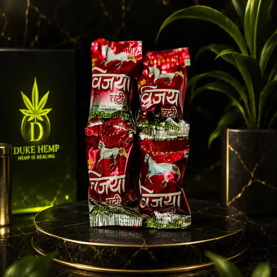 Vijaya Vati Bhang Goli multipack by Duke Hemp displayed on luxury black marble platform
